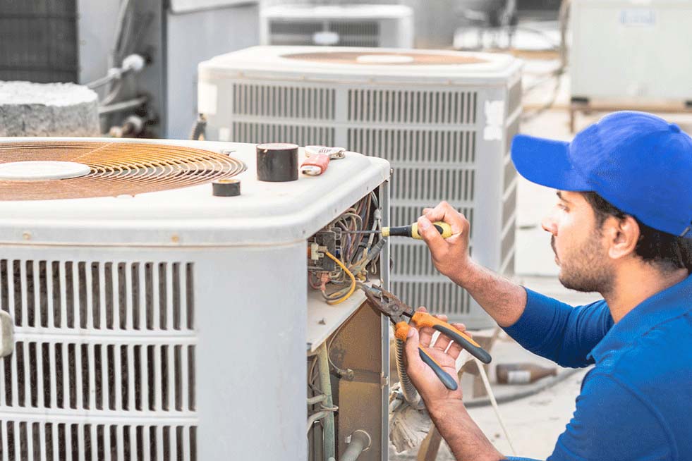 Exterior Air conditioner being repaired